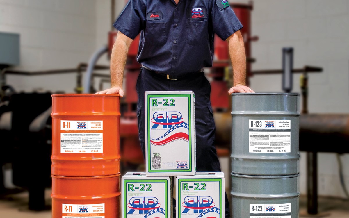 A Rapid Recovery Engineer stood with Rapid Recovery branded products