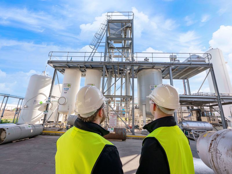 Technicians Looking at Separators