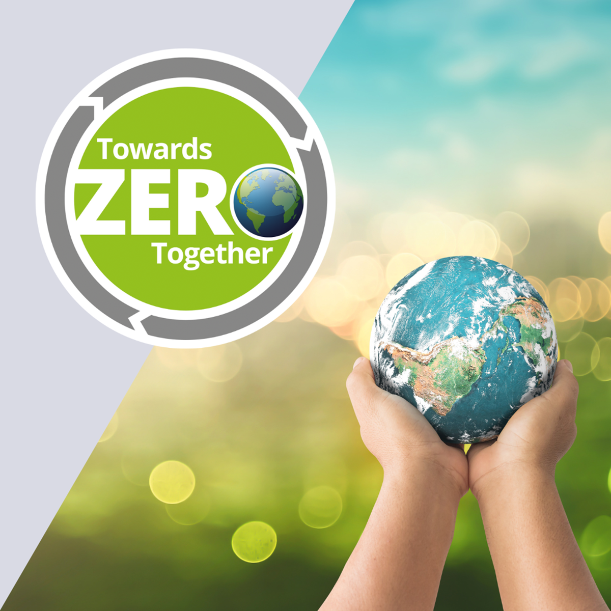 Two hands holding a model of the globe on the right-hand side with the A-Gas "Towards Zero, Together" on the left