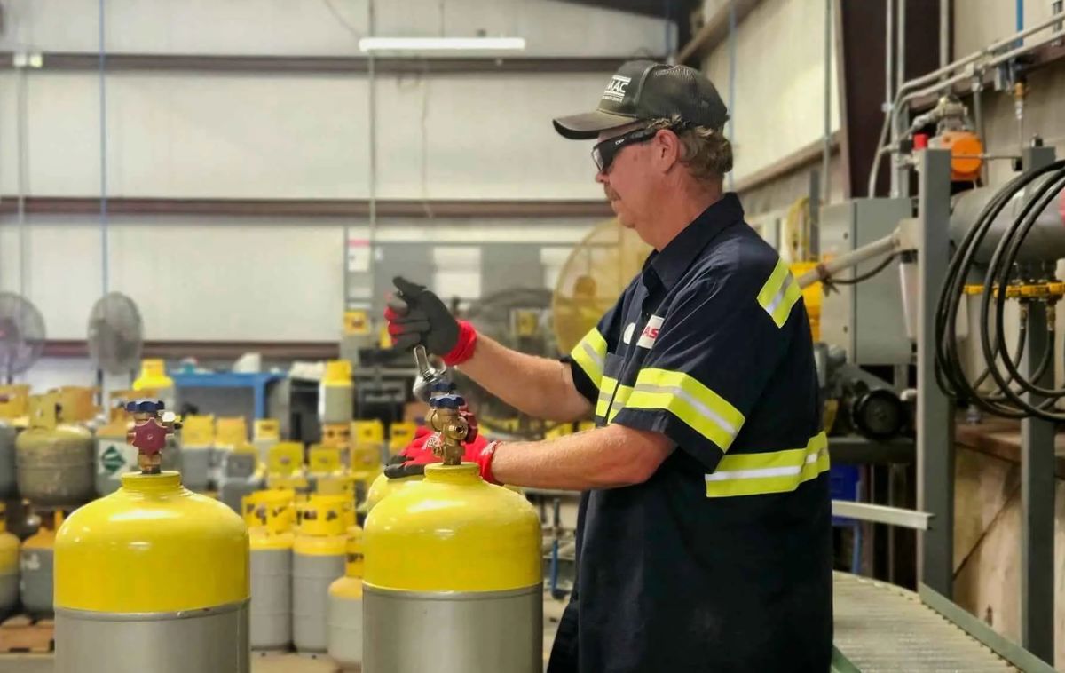 Man Working With Cylinder