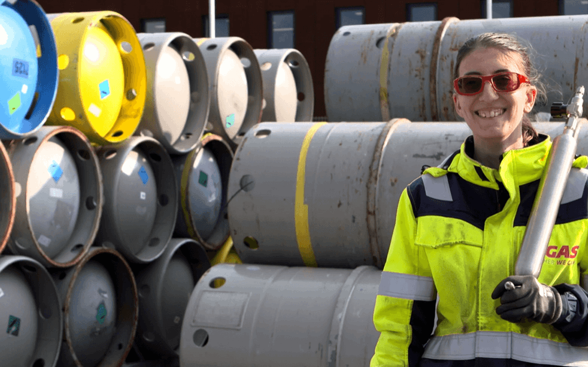 female site engineer with cylinders