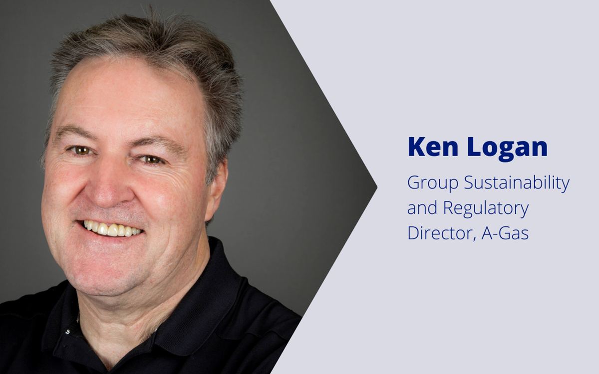 A graphic with a man smiling against a grey backdrop on the left and blue text on the right