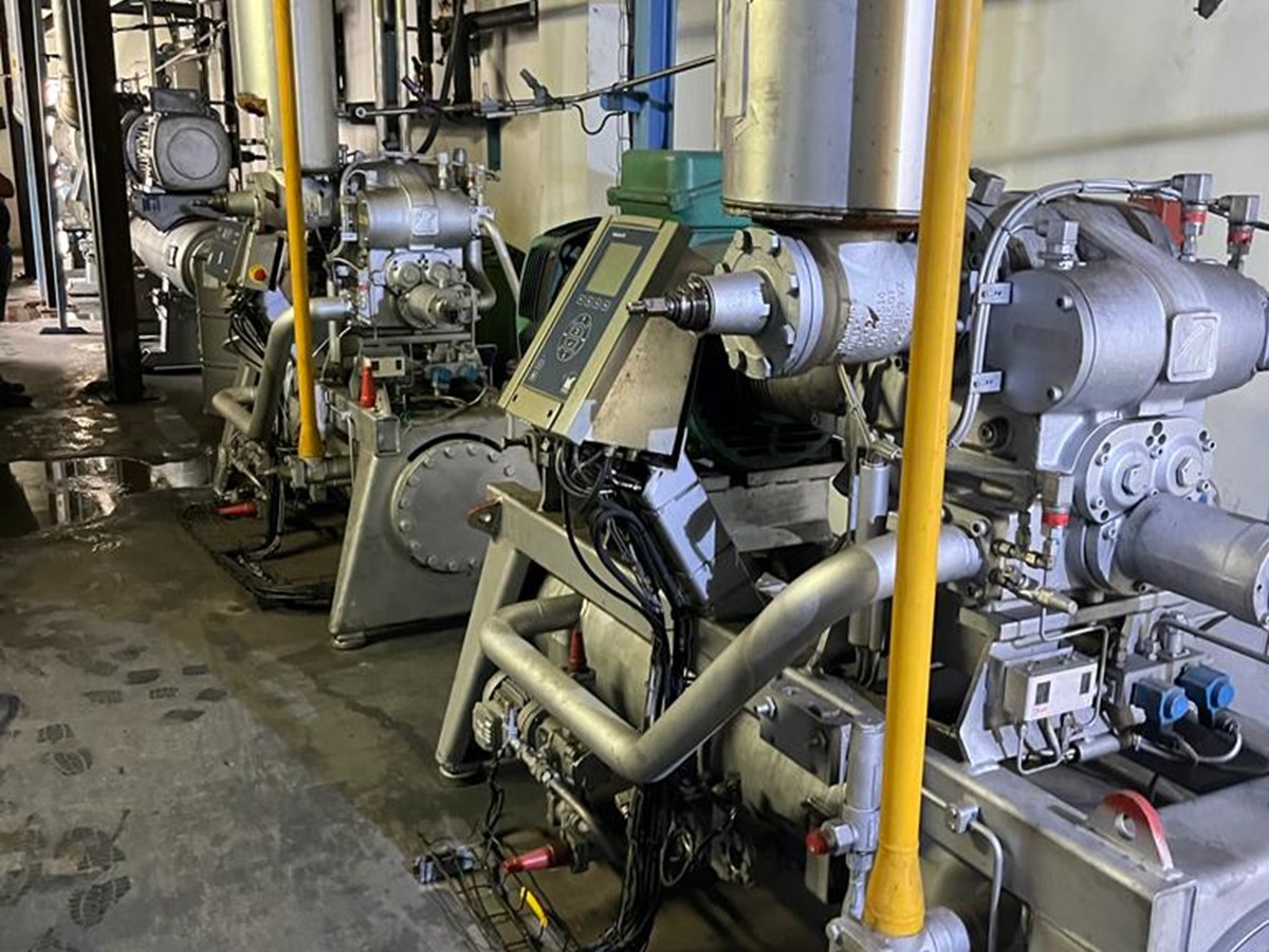Grey metal refrigerant equipment in a warehouse